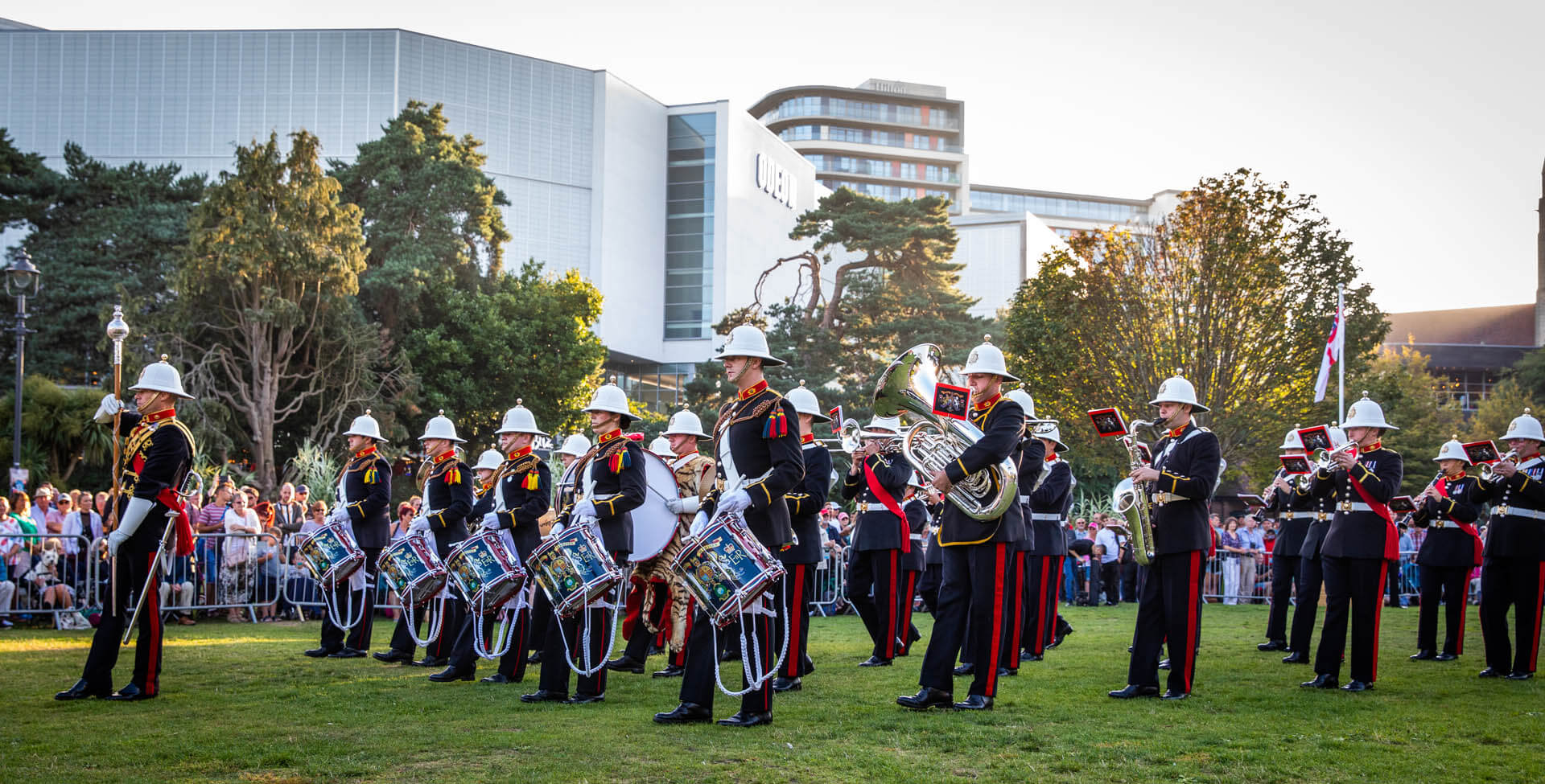 Army band performing in Bournemouth gardens to visitors and onlookers