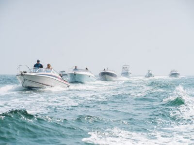 Sunseeker boats driving in formation across the sea
