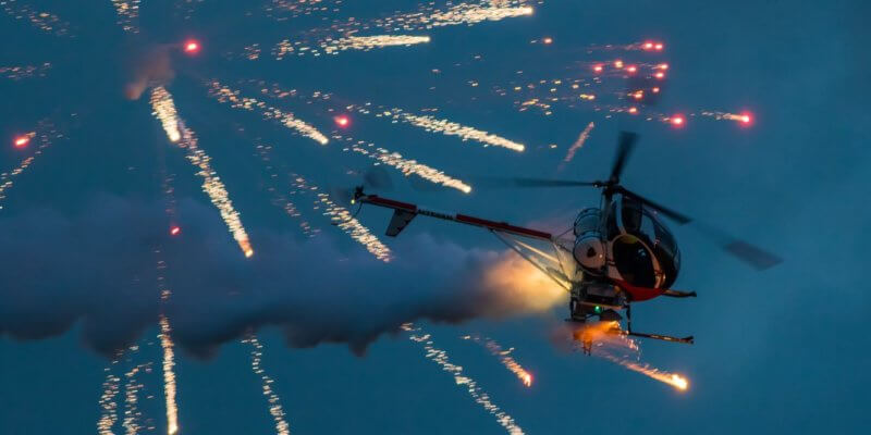 Otto the helicopter with fireworks flying off