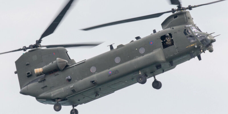 RAF chinook flying through the clouds
